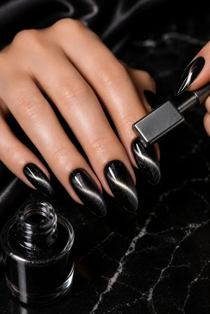 8. Mysterious Black Cat Eye Nails