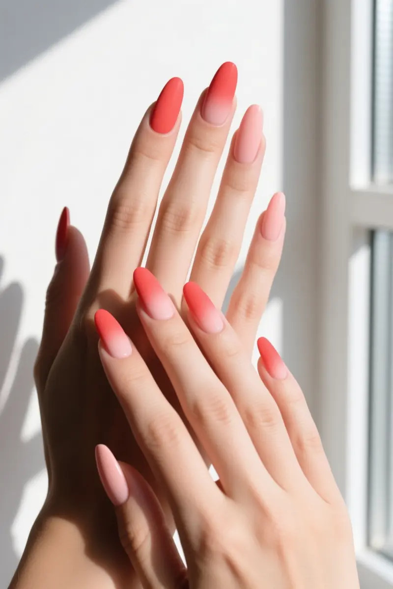 2. Peachy-Coral Matte Coffin Nails