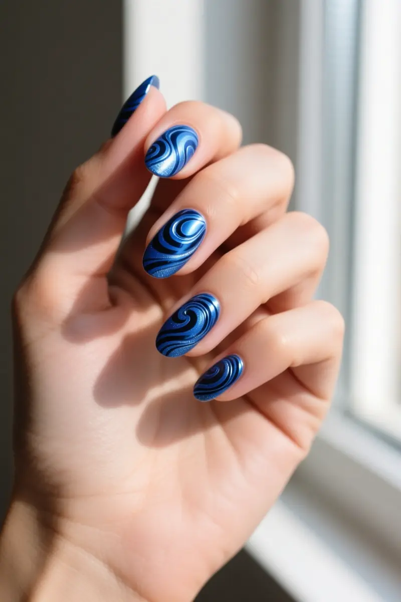 4. Abstract Blue Chrome Swirls on Bare Nails