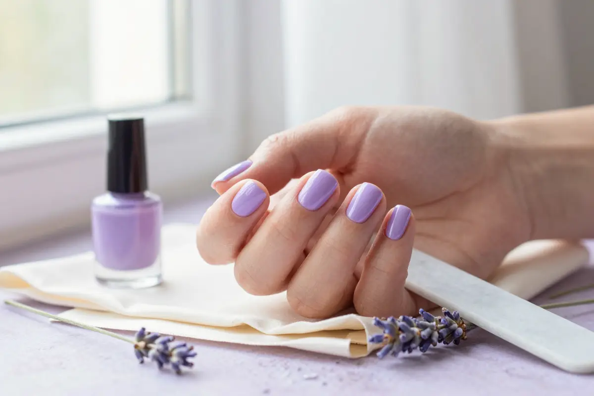 1. Glossy Pastel Lilac on Short Square Nails